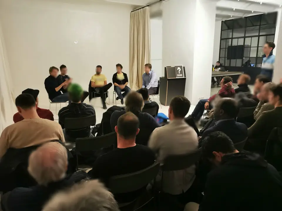 Publikum bei einem Treffen von Bitcoin Austria in Wien